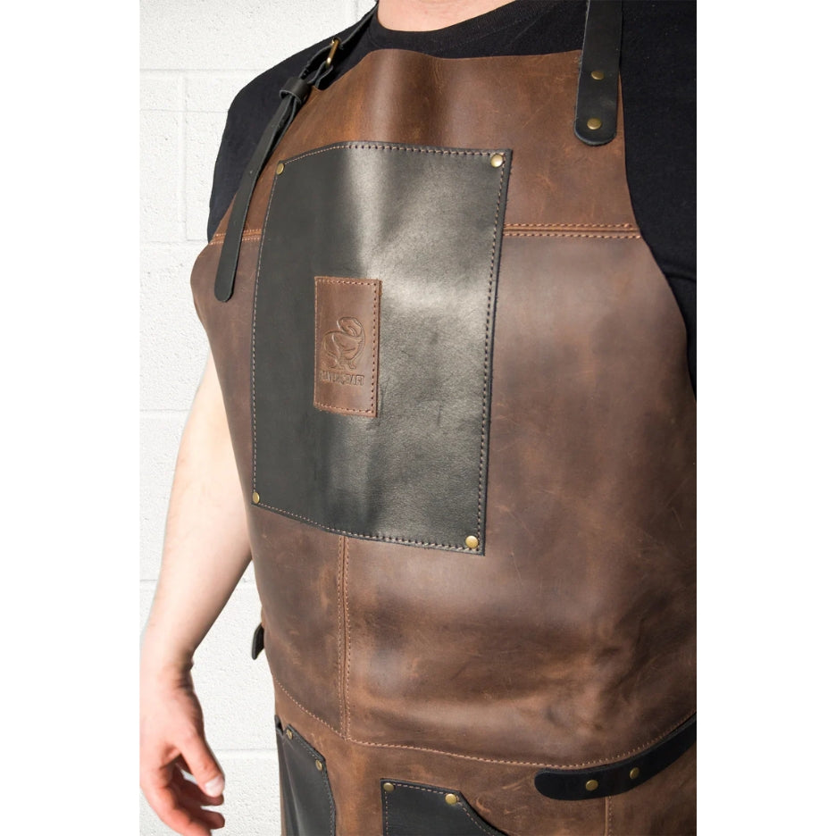 Angle view of man wearing Beavercraft AP3X – Adjustable Black&Brown Leather Work Apron
