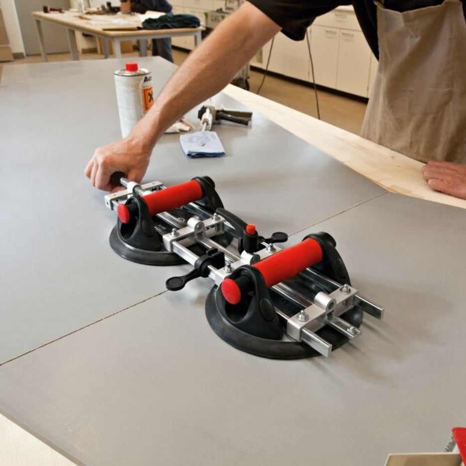 Person using Bessey Tools Extra Large Seaming Tool on grey panels