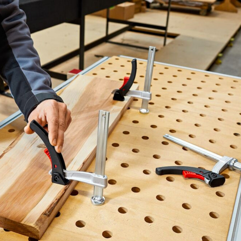 Bessey Tools 8 inch MFT KilKlamp Ratcheting Clamp for 19mm Holes clamping a wood plank