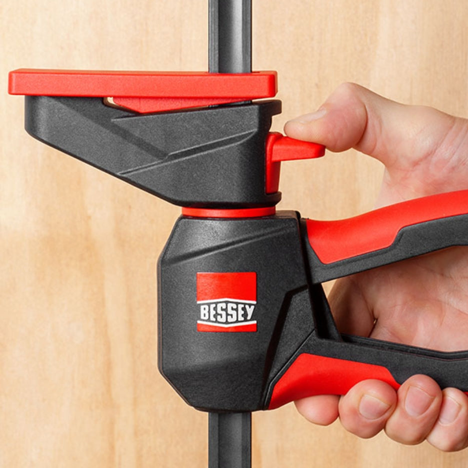 Ergonomic composite handle and easy-release trigger