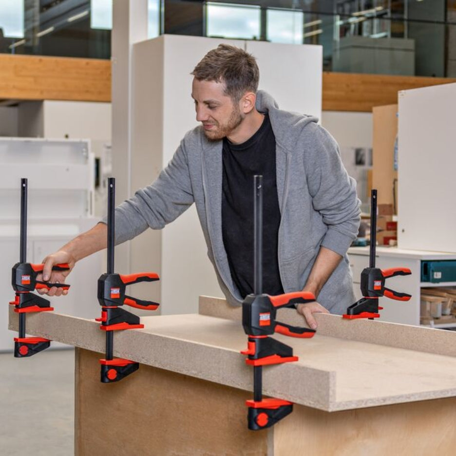 Multiple Bessey Tools Trigger Clamps being used at once to hold project in place