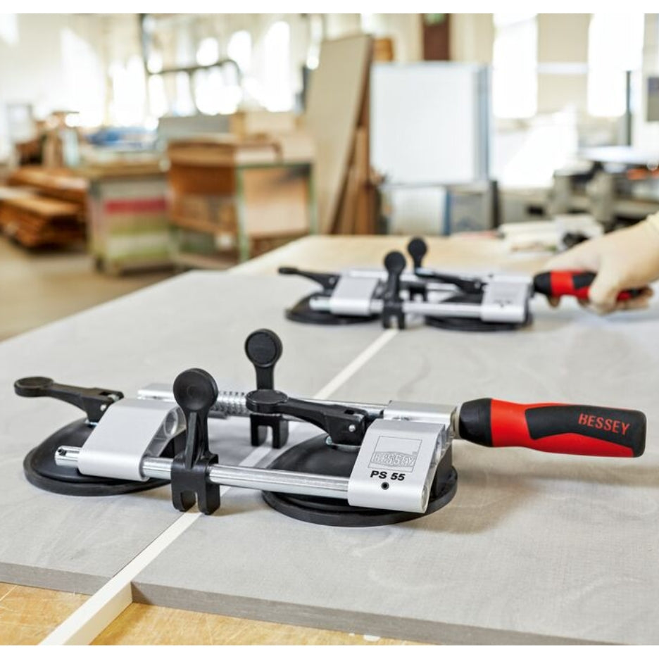 Bessey Tools Solid Surface Seaming Tool on a wooden surface with a blurred workshop background