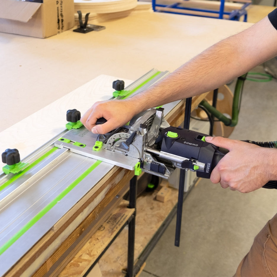Man using Domino Joiner with FastCap Domino Sled and Stops