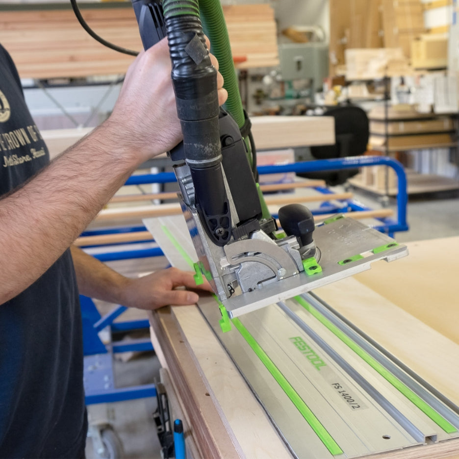 Locking tabs keep Sled secured to Domino Joiner