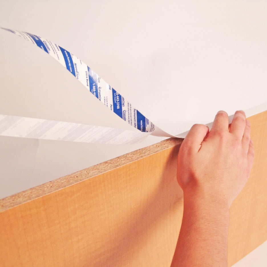 FastCap peel and stick edgebanding being applied
