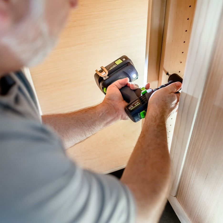 Festool TXS 18 Cordless Drill Set 576903 driving screw in narrow cabinet with right angle cabinet