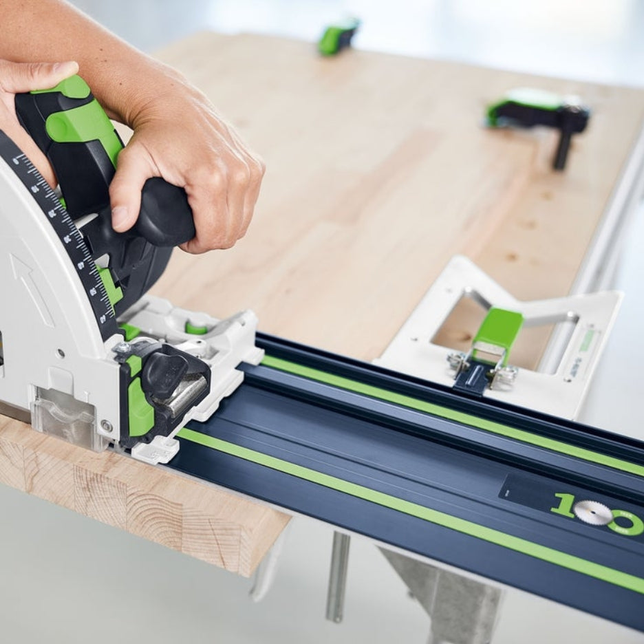 Hands holding track saw running on FS 1400 limited edition 100 years guide rail