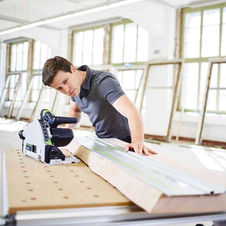 Festool 1400mm Guide Rail FS 1400/2 being used to as a guide to cut a wood plank