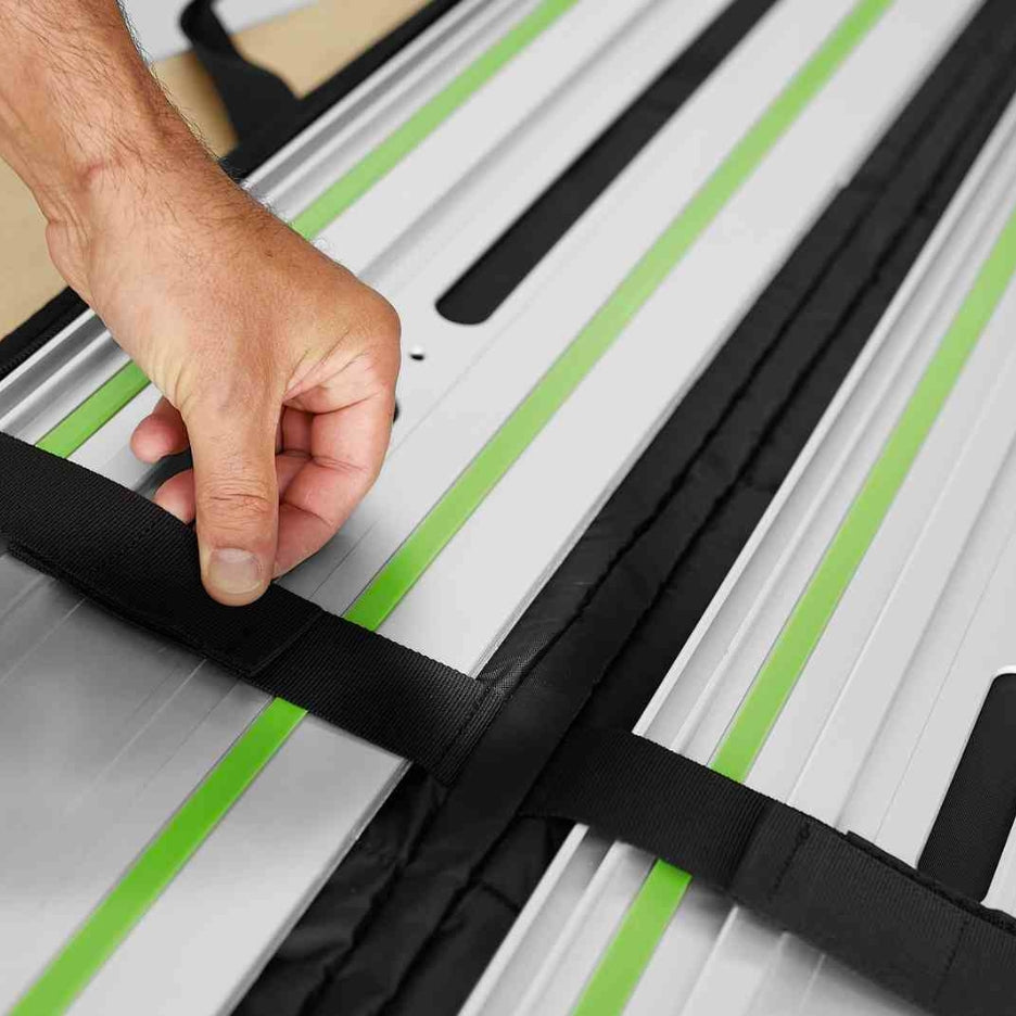 Hand strapping guide rail in guide rail bag