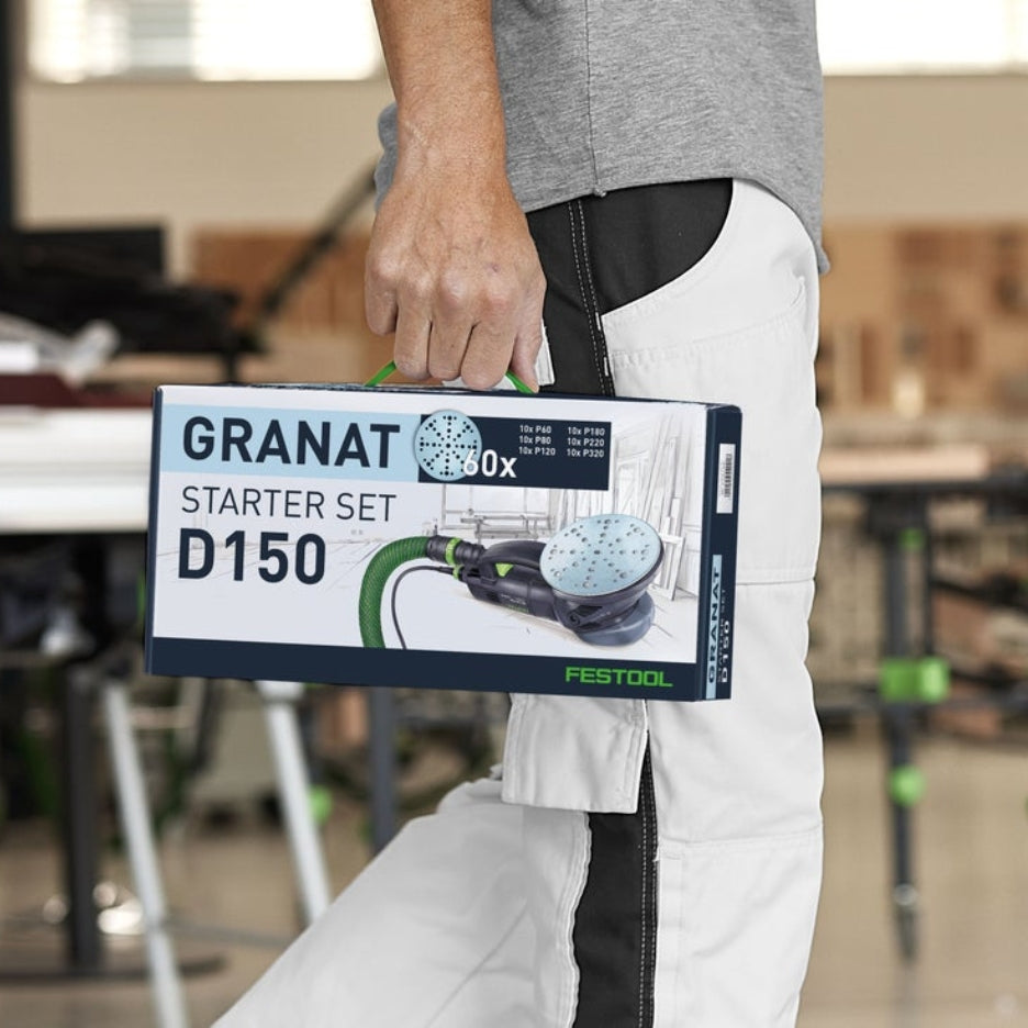 Man carrying Festool Granat Assortment Set