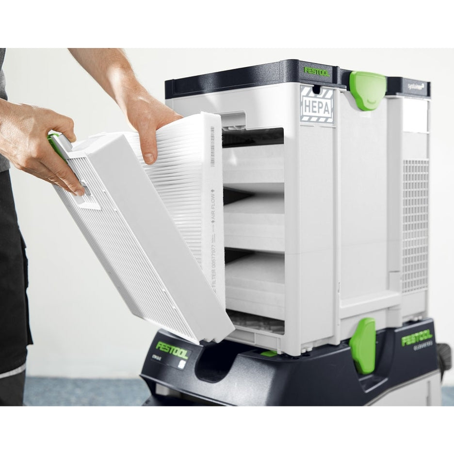 Hands holding Festool Air Filter SYS-AIR HEPA's preliminary filter