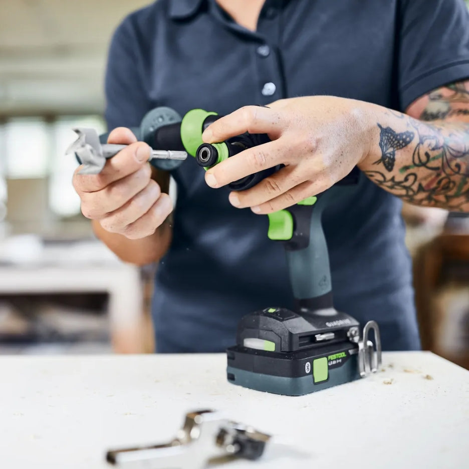 Person installing drill bit into Festool Cordless Hammer Drill TPC 18/4