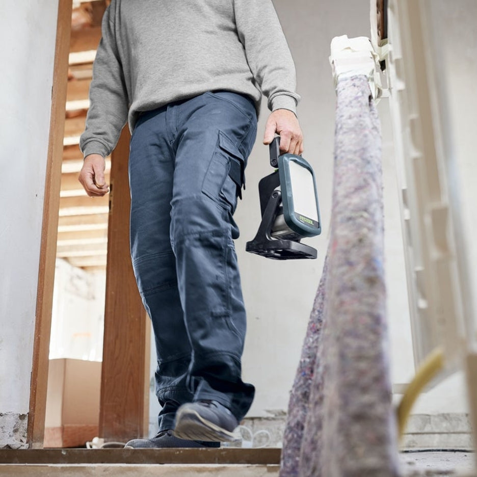 Man holding Festool Cordless Site Light SYSLITE KBS C