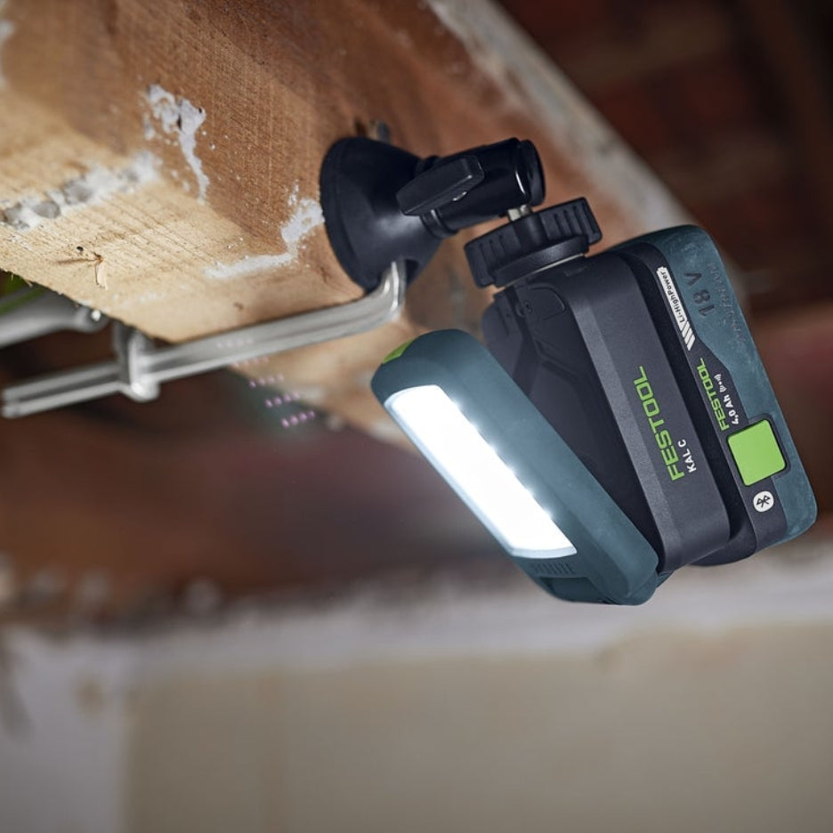 Festool Cordless Task Light SYSLITE KAL C attached to wood beam