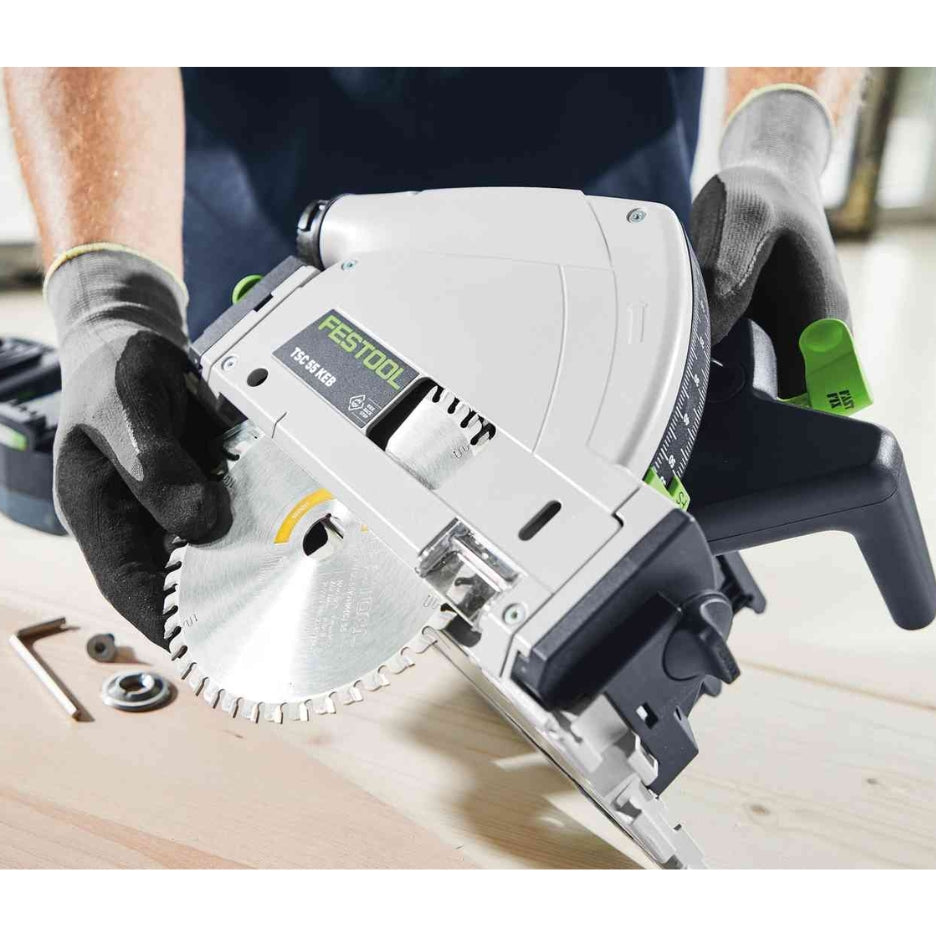Hand removing blade from Festool Cordless Track Saw 160mm TSC 55 KEB