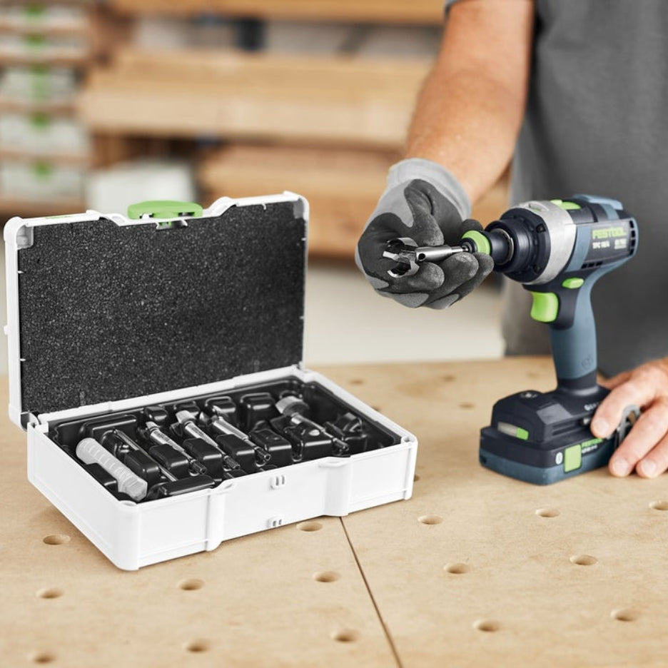 Man attaching Festool forstner bit to cordless drill