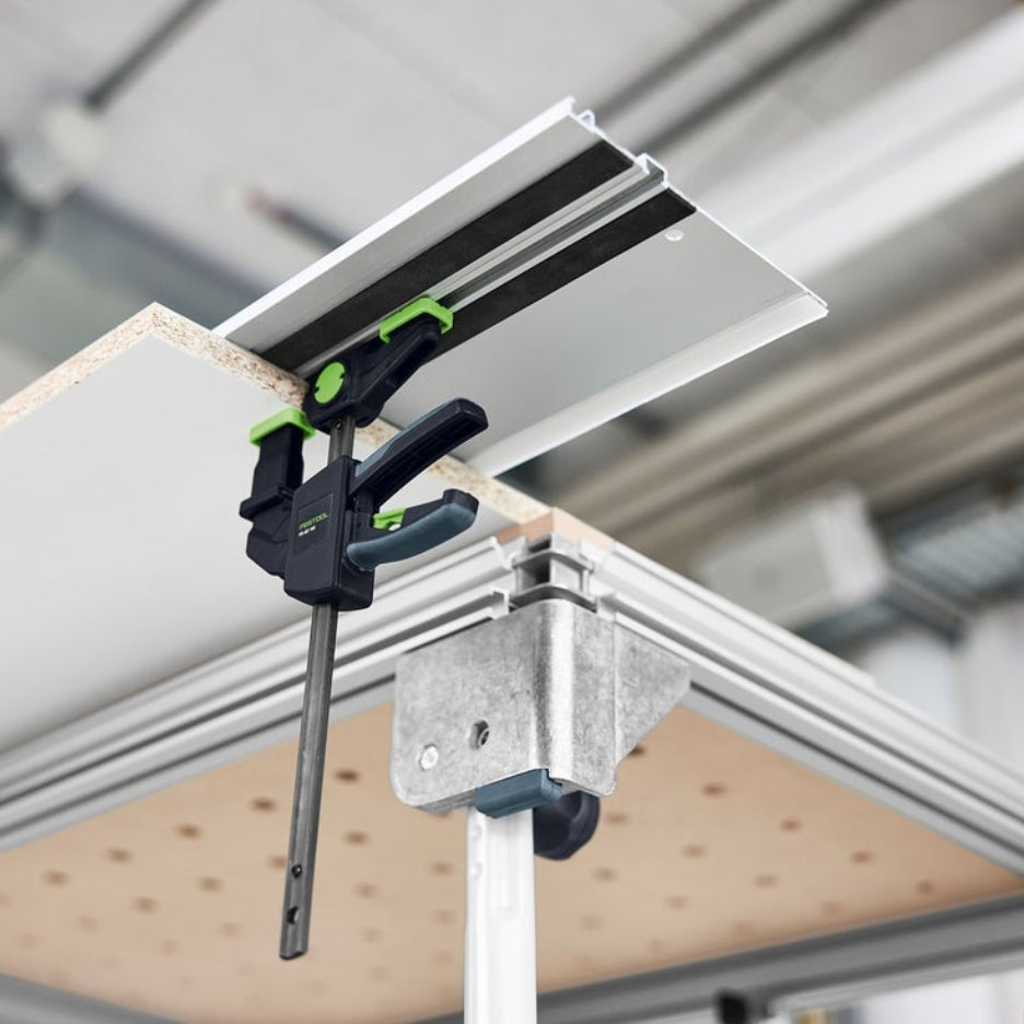 Festool One-Handed Clamp FS-EZ 150 clamping a piece of wood to a guide rail.