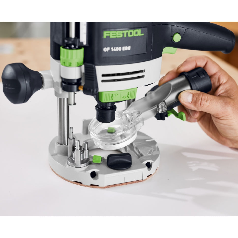 Hand holding Festool Extraction Hood with Light Module close to a Festool Plunge Router OF 1400 EQ-F-Plus