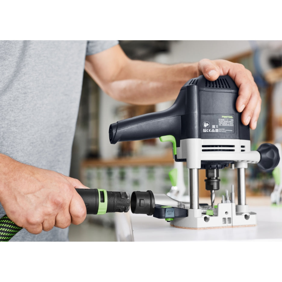 Hands attaching dust extractor hose to Festool Plunge Router OF 1400 EQ-F-Plus