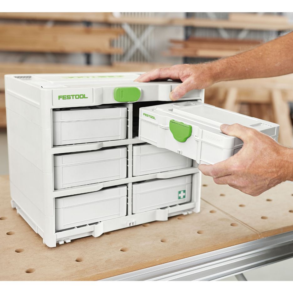 Hand putting a MINI-Systainer in the Festool Systainer Rack SYS3-RK/6 M 337