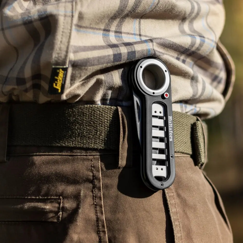 Hultafors Outdoor Folding Knife clipped to belt