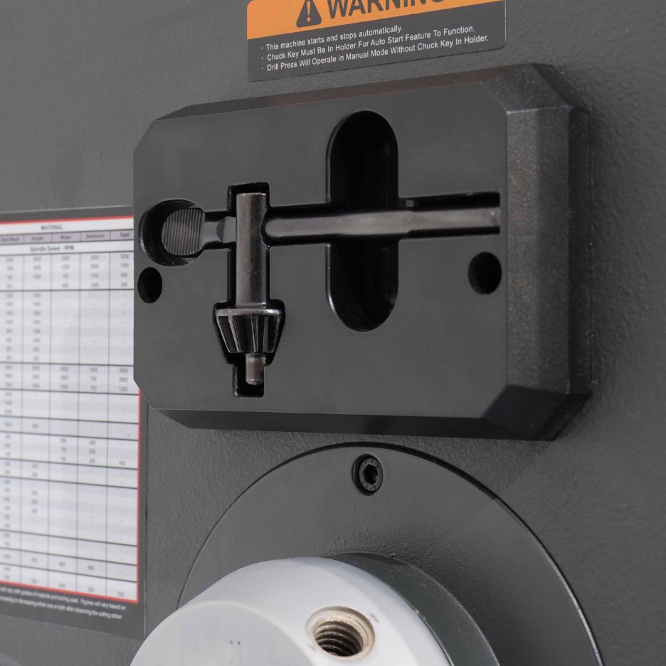 Chuck is held in place by a magnetic holder on the side of the Drill Press