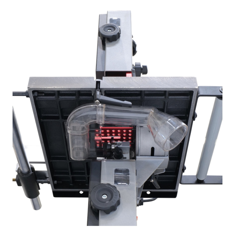 Quick-release magnetic under-table dust port