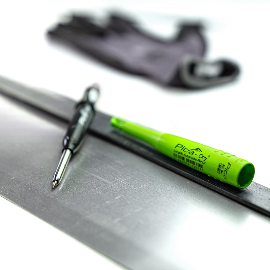 Pica Dry with Metal Scribe 30800 with quiver cap on steel workpiece