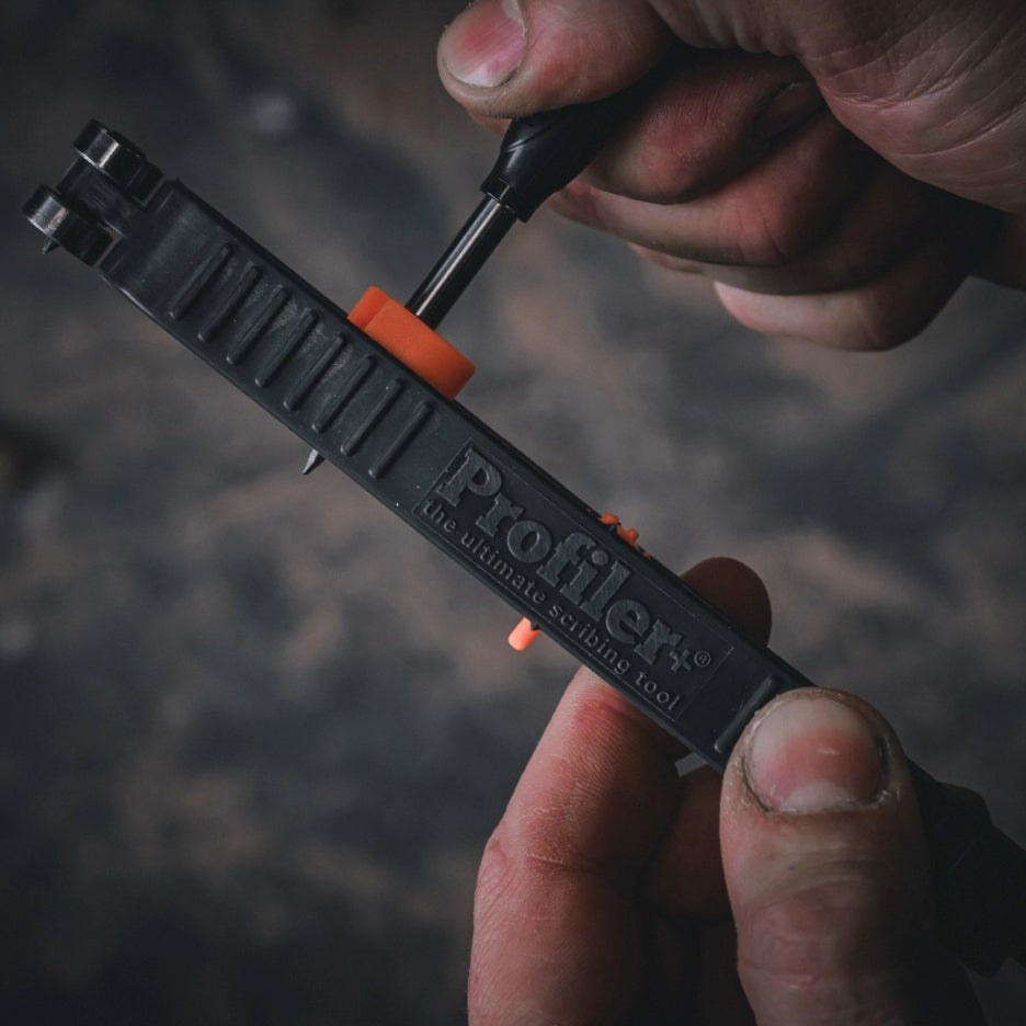 Hands holdingProfiler+ with marker inserted