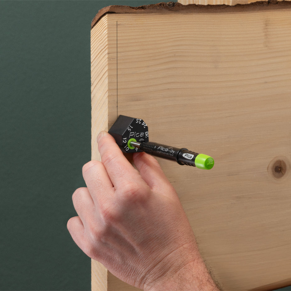 Pica Scriber Block and Pica Dry pencil marking a line 12mm from the end of a board.