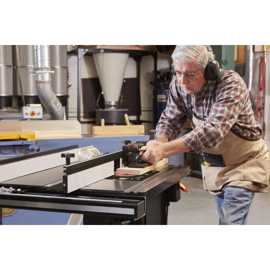 Man using saw with SawStop ICS 30 Inch In-Line Router Table