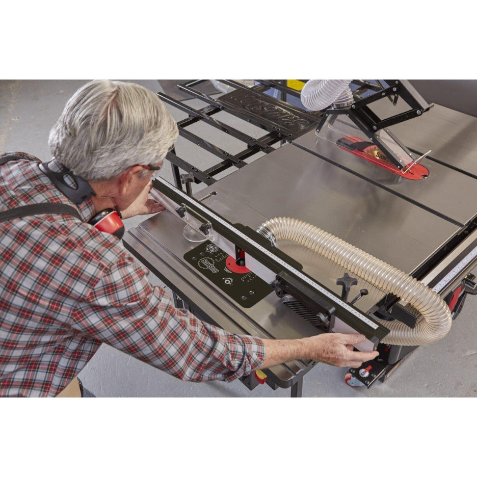 Man using saw with SawStop ICS 30 Inch In-Line Router Table