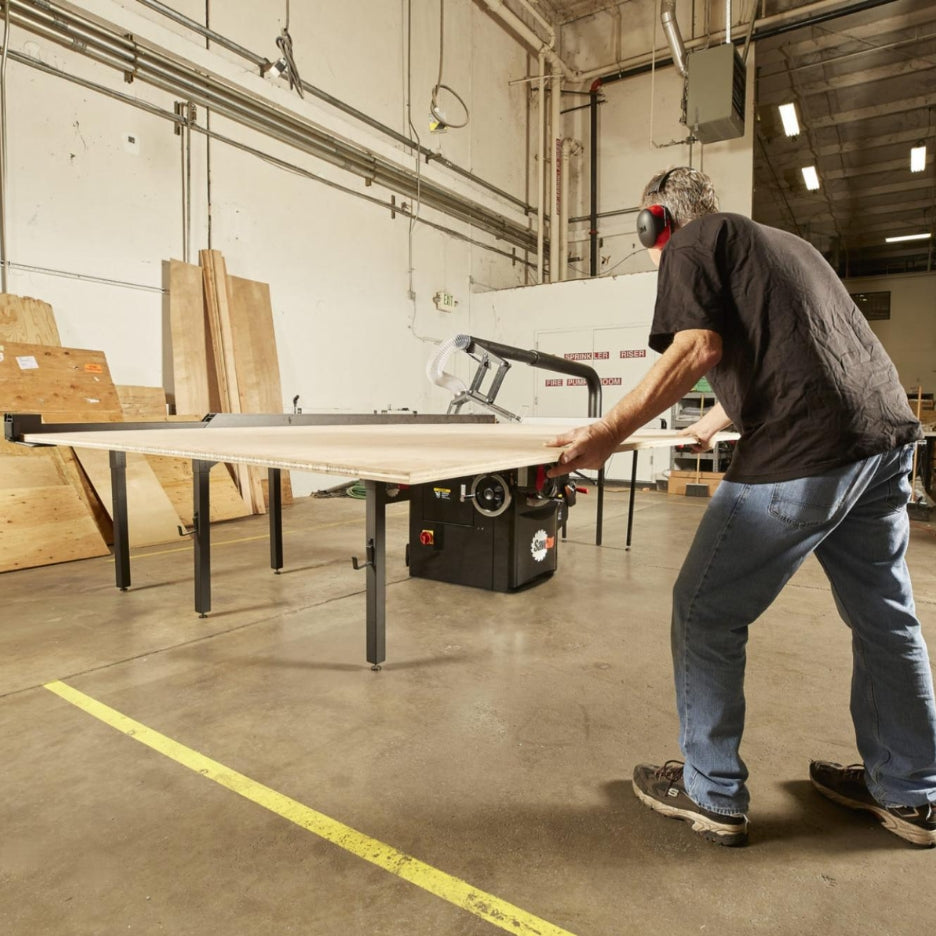 Man using SawStop Large Sliding Table for Table Saws