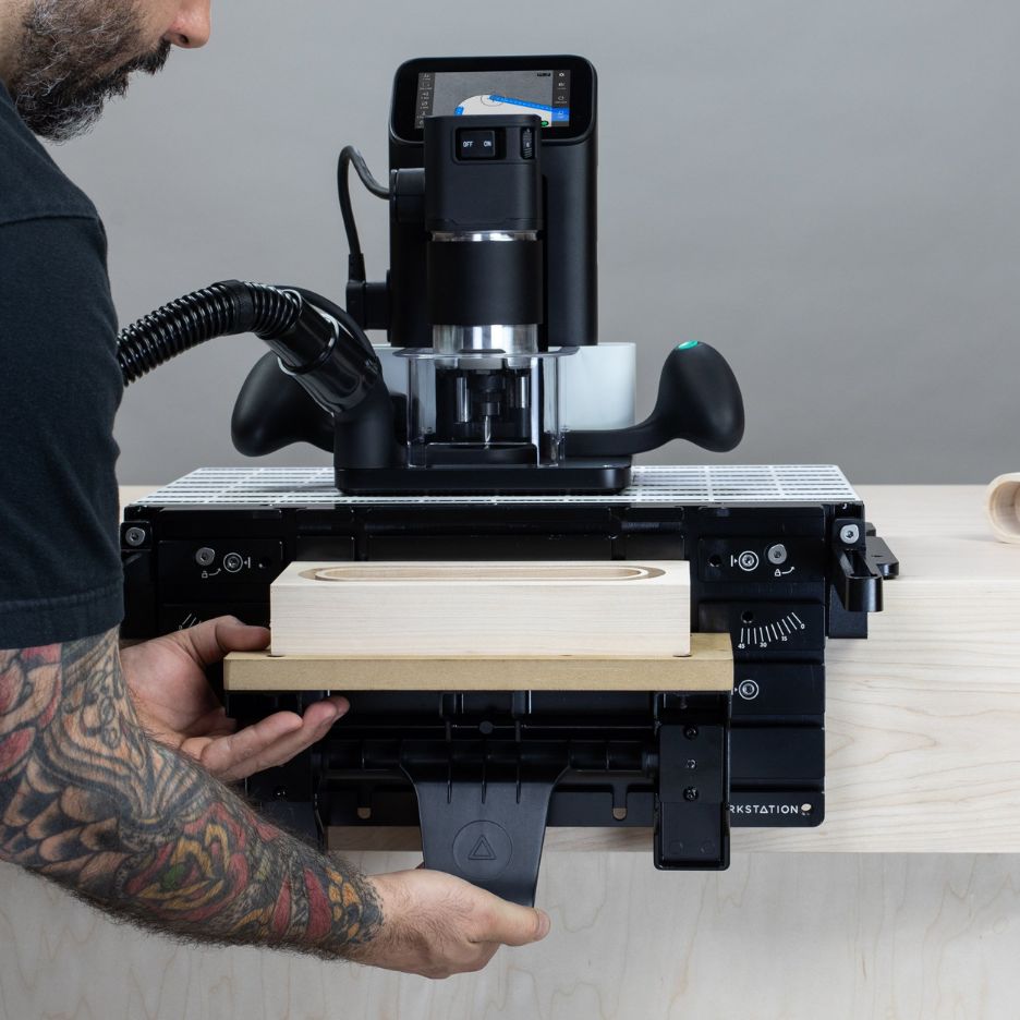 Man adjusting Workstation