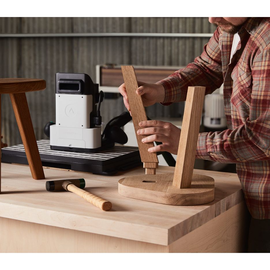 Man assembling stool
