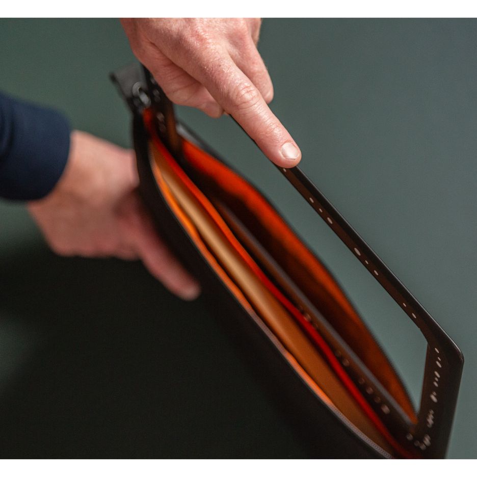 Hands inserting Trace Frame in Shaper Tools Trace Case