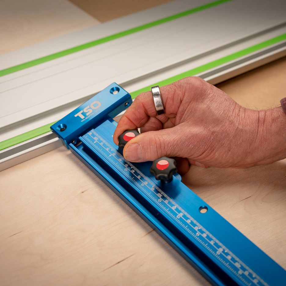 Hand securing track with screws into TSO Drop-On Guide Rail Adapter