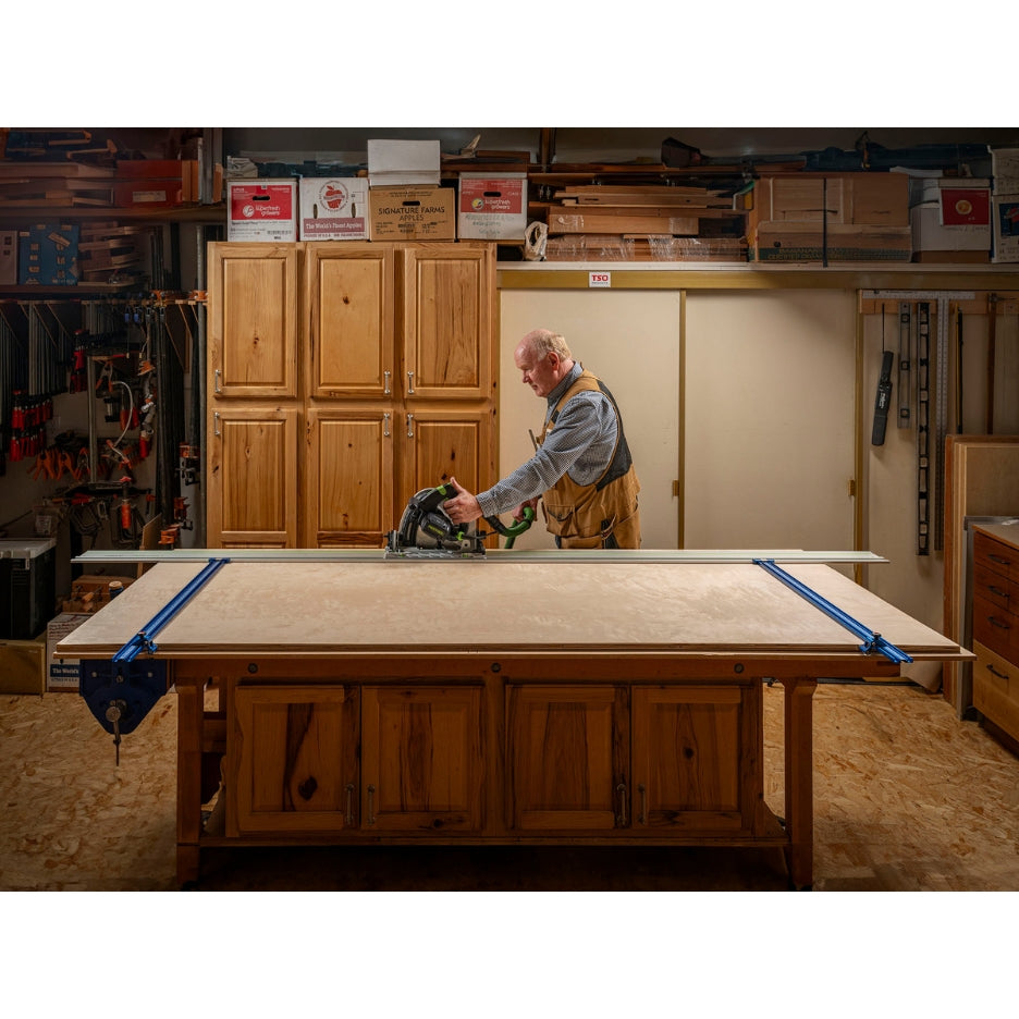 Man using a Festool track saw on a Festool guide rail being held by TSO Products Parallel Guide System Gen 2