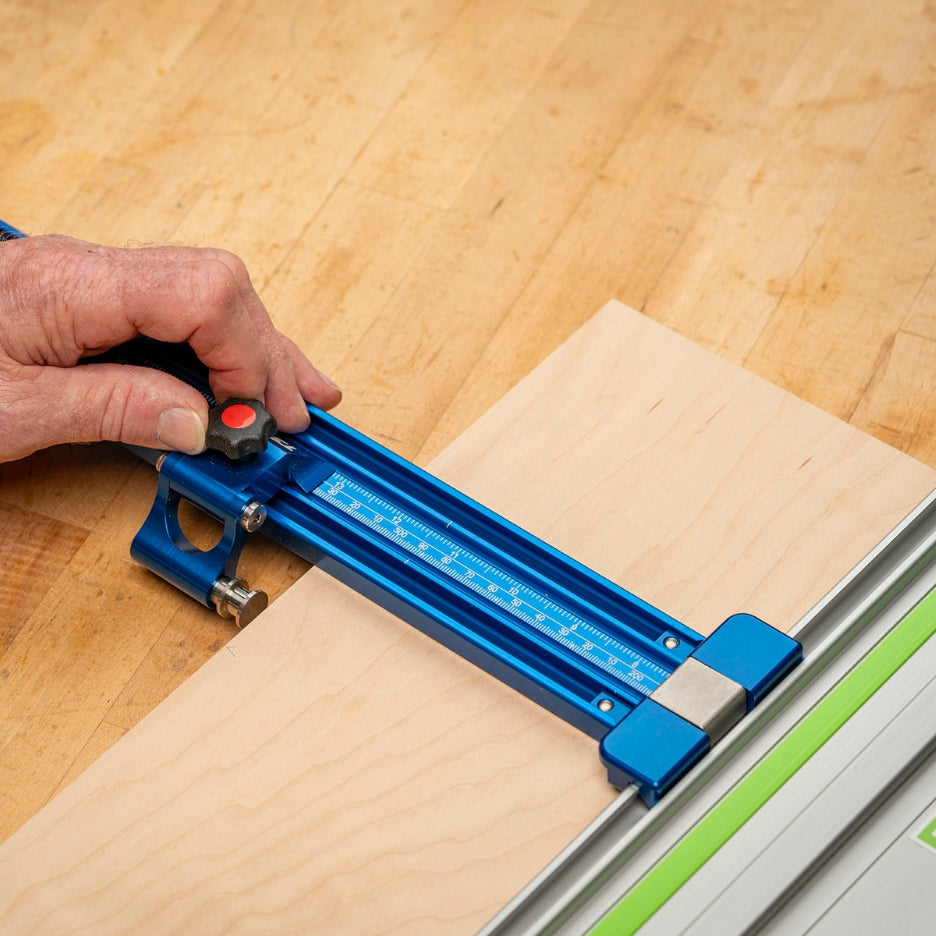 Hand adjusting Flip Stop Pro attached to Parallel Guide System Gen 1