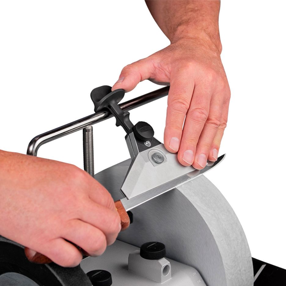 Knife being sharpened with Tormek Wide Centering Knife Jig angled picture