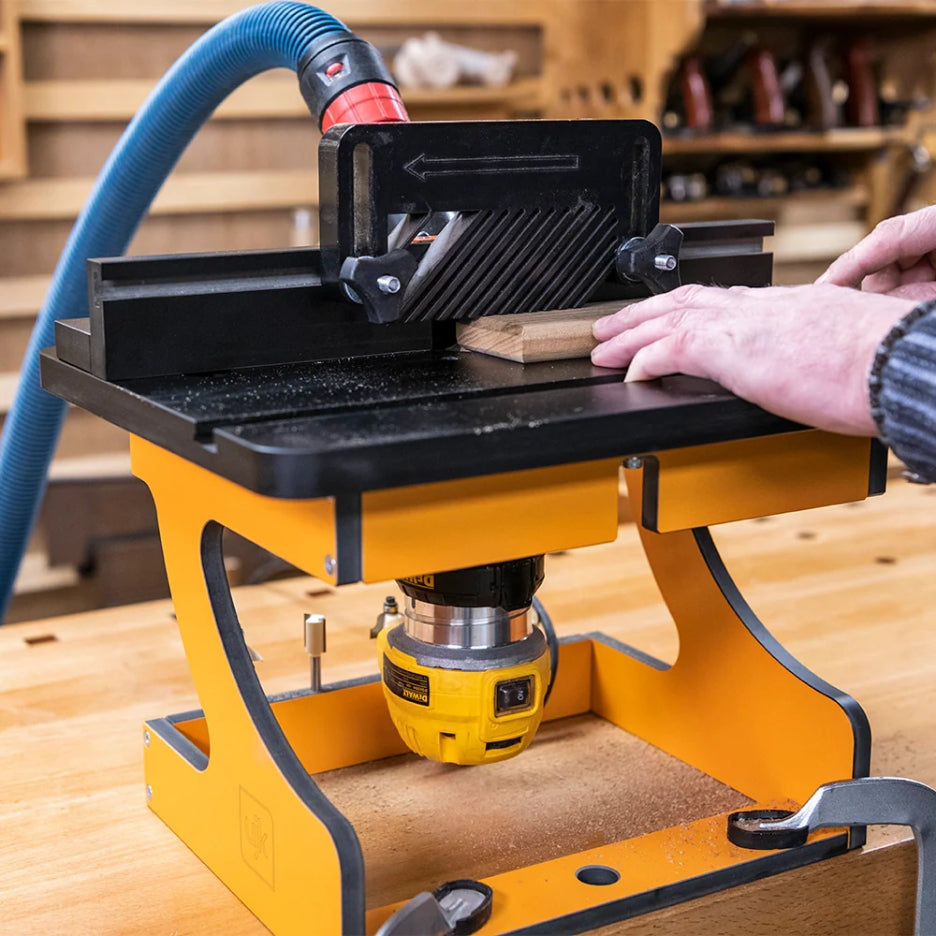 UJK Tools Portable Trim Router Table with a person operating it in a workshop setting