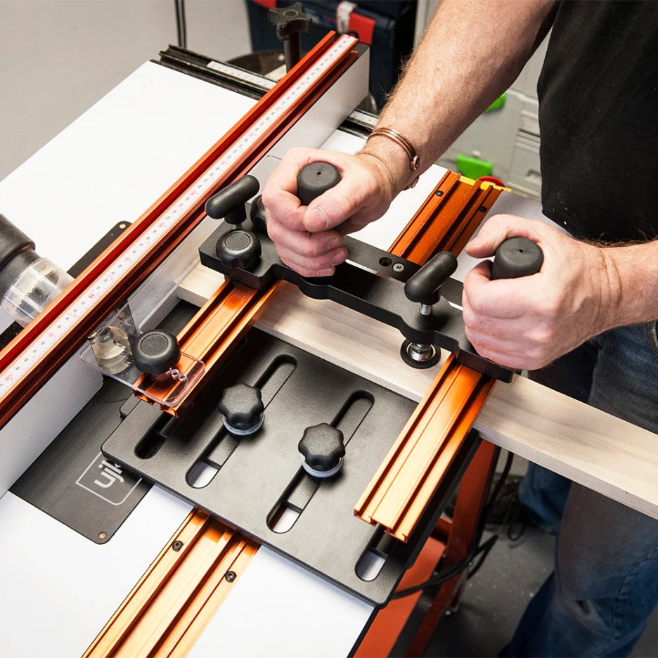 Person using UJK Tools Professional Coping Sled on a table saw