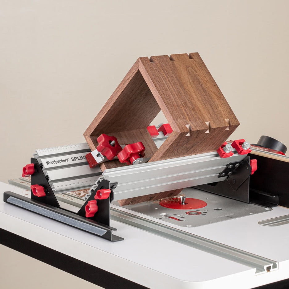Woodpeckers Spline Jig SPLINE-23 on router table with mitred box cutting dovetail spline slots