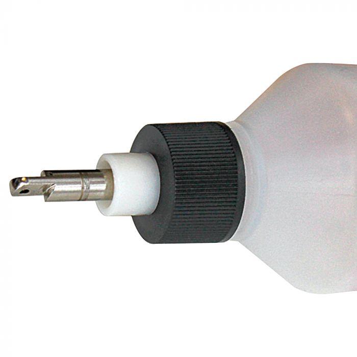 Metal tip directs glue to both sides for fast and efficient application of adhesive