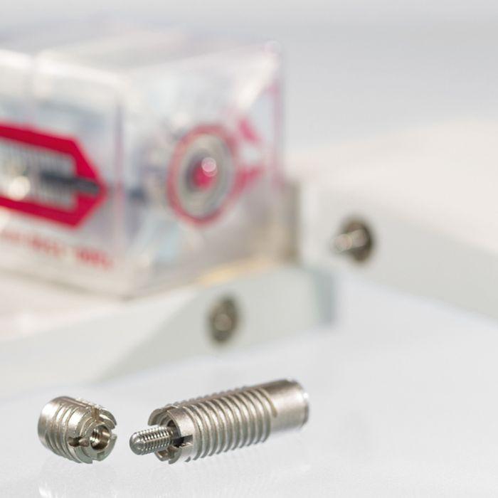 Male and female parts of the Lamello Inis Mx2 Magnet-Drive Invisible Clamping System