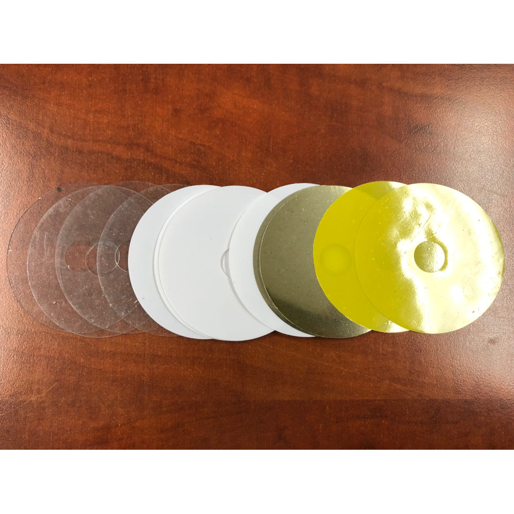 12 colour-coded plastic shims by FS Tool with 5/8" bore. For dado stacks.