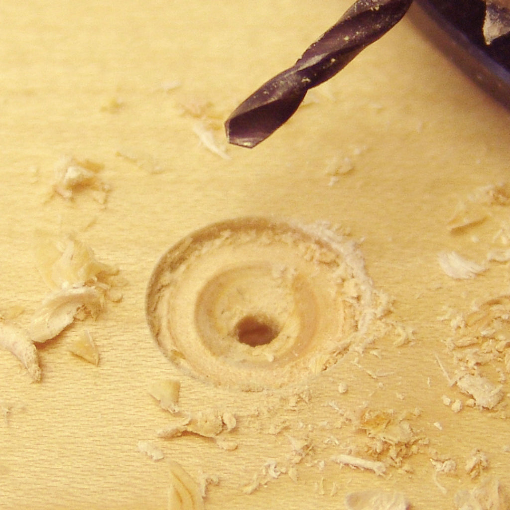 The FlushMount Drill System creates perfectly-sized holes the right depth for a PowerHead Screw and cap.