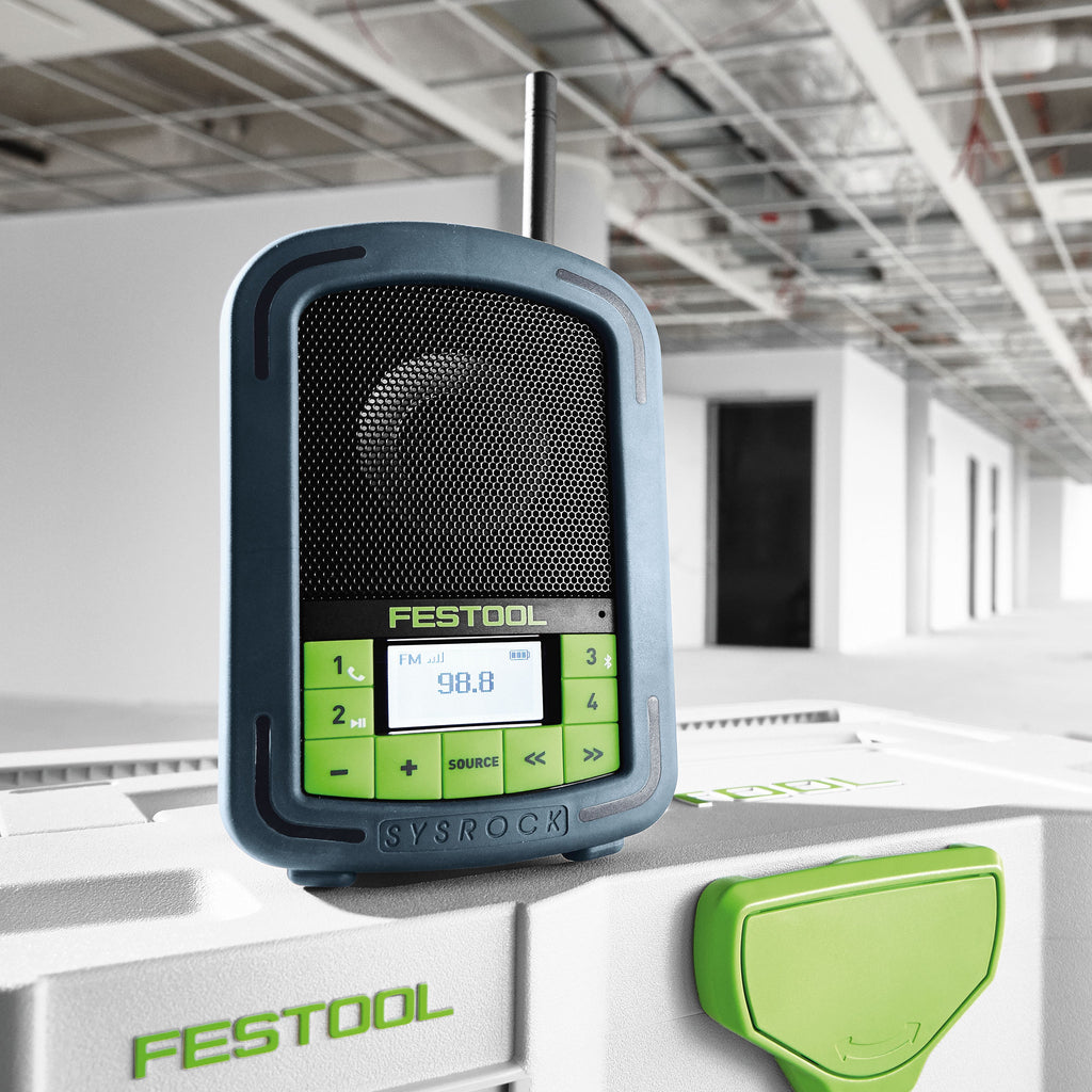 The SYSROCK sitting on top of a Systainer tuned to 98.8 FM, with full battery life.