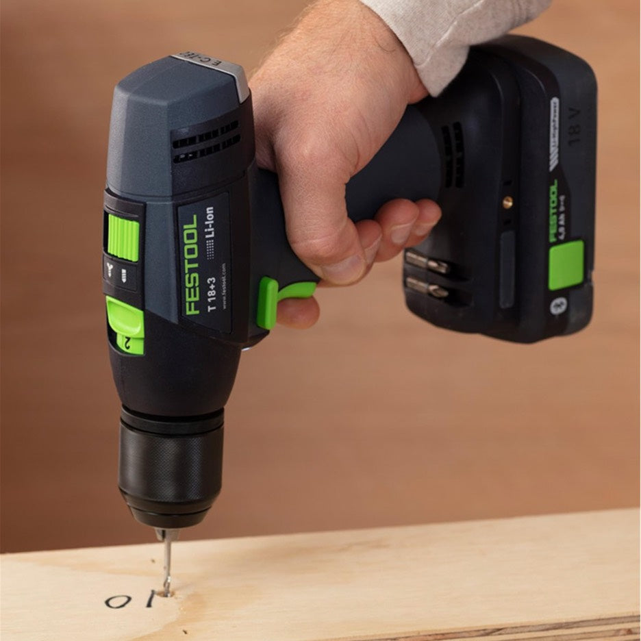 An operator used the Festool T 18 Easy set to speed 2 to drill a 1/8" hole in a piece of 3/4" thick plywood.