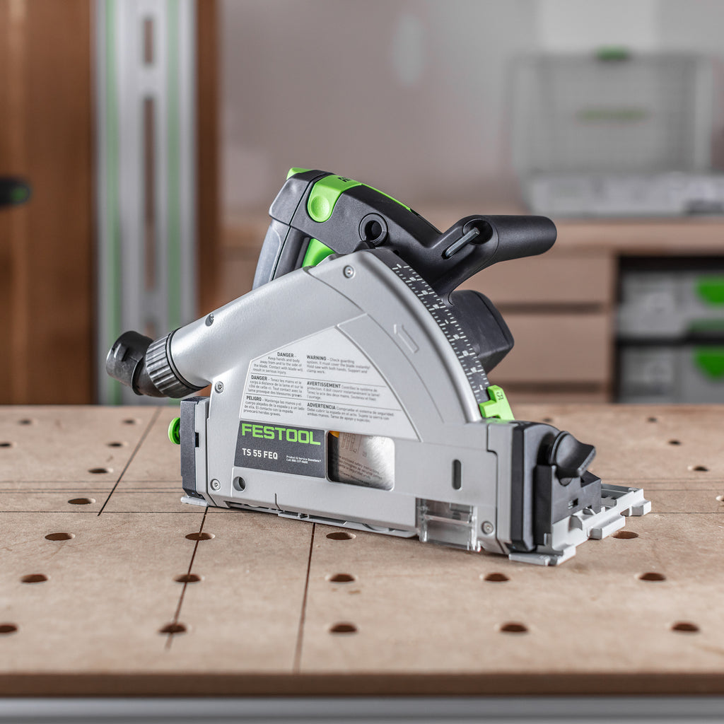 Festool's TS 55 FEQ Plunge-Cut Track Saw sitting on top of a MFT worktable.